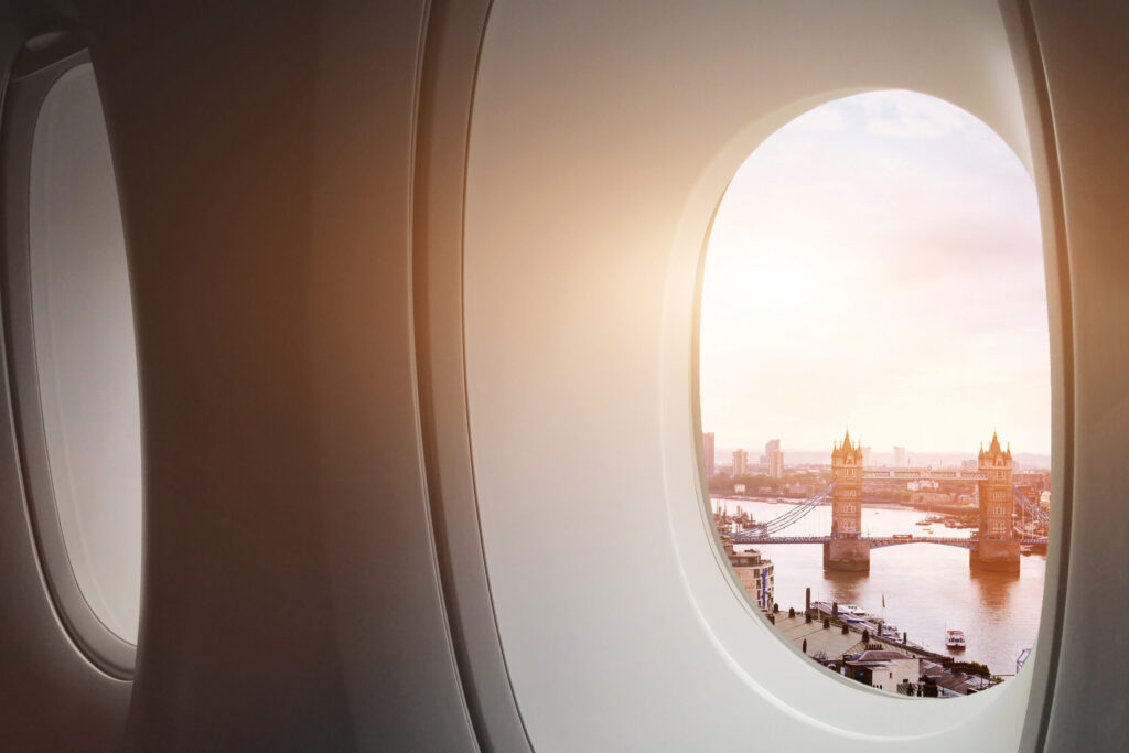 travel to London, view of Tower Bridge from window of airplane, tourism