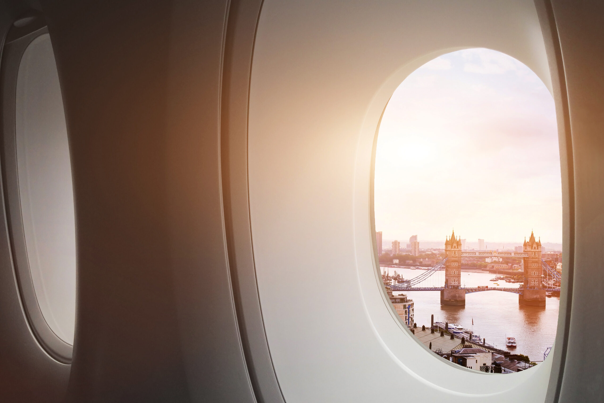 travel to London, view of Tower Bridge from window of airplane, tourism