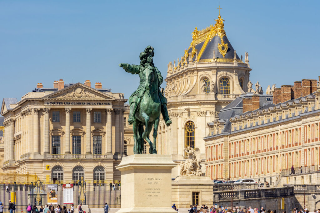 Versailles, France - 04 April 2025: Monument to king Louis XIV and Royal chapel of Versailles palace