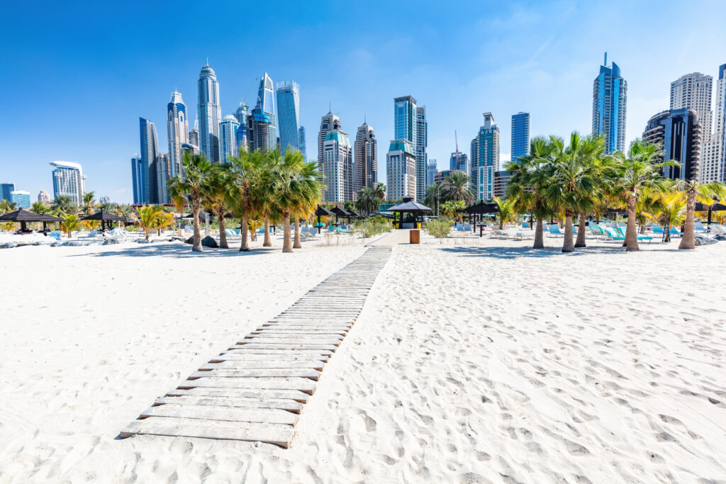 Dubai jumeirah beach with marina skyscrapers in UAE. Popular public JBR beach